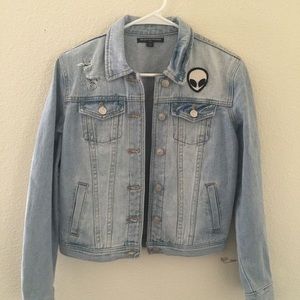 Trendy denim jacket: brand is “Brandy Melville”